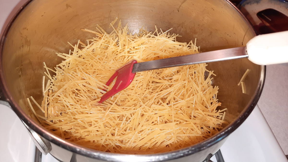 Browning the capellini pasta